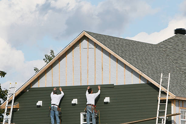 Professional Siding Replacement technician working in Leander, TX
